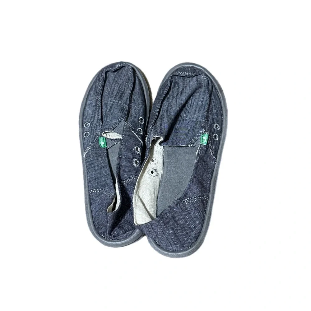 Sanuk slip sidewalk